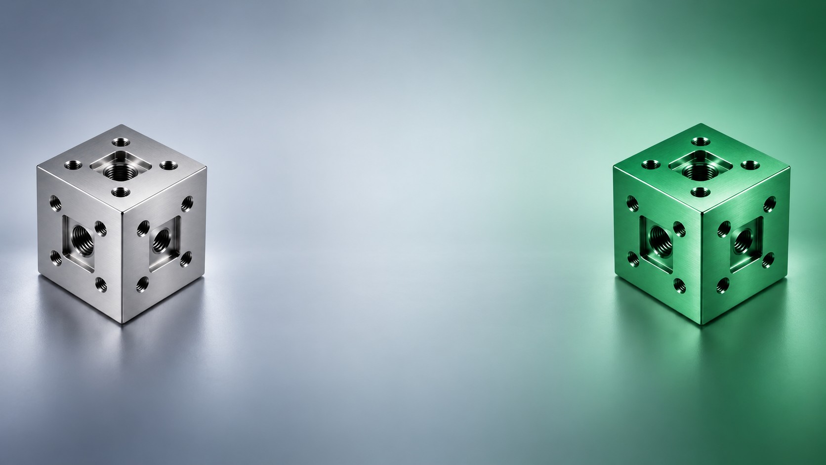 Two module-node cubes side by side, one in steel and one in green